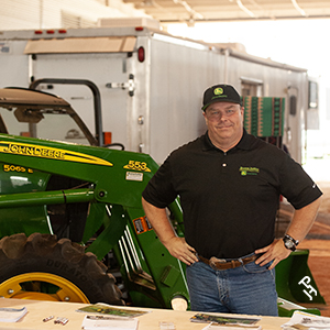 John Deere representative at their booth.