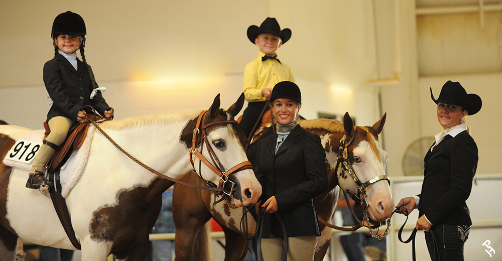 Two young AjPHA members take the reins under the watchful guidance of their mentors.