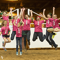 Regional club youth celebrating at a show.