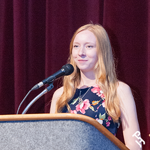 Youth member presenting at the AjPHA Membership Meeting.