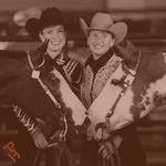 Two amateur exhibitors smiling with their horses.