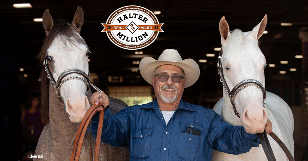 Bill Bolinger smiling with two of his horses.