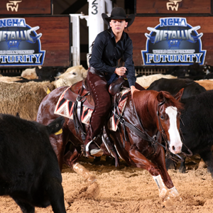 A Paint Horse competing at an NCHA futurity.