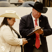 A judge signing the scribe sheet.