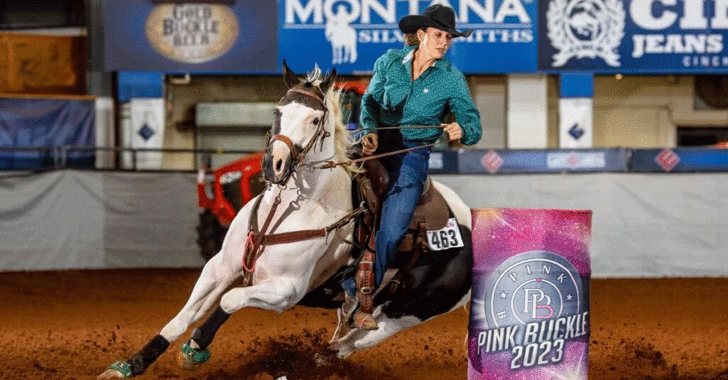 A Paint Horse rounding a barrel at the Pink Buckle.