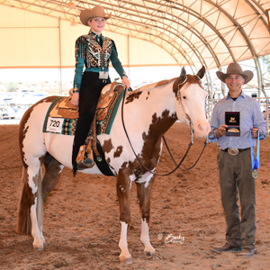 Western National champion posing with their award.