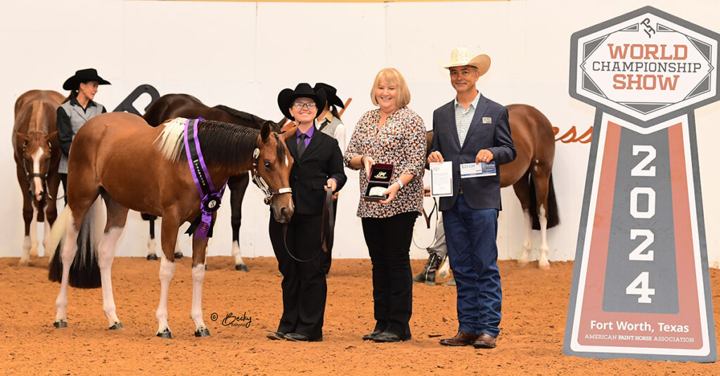 Adrianna Ortiz and Tardee to Hollywood accepting their Champion award.